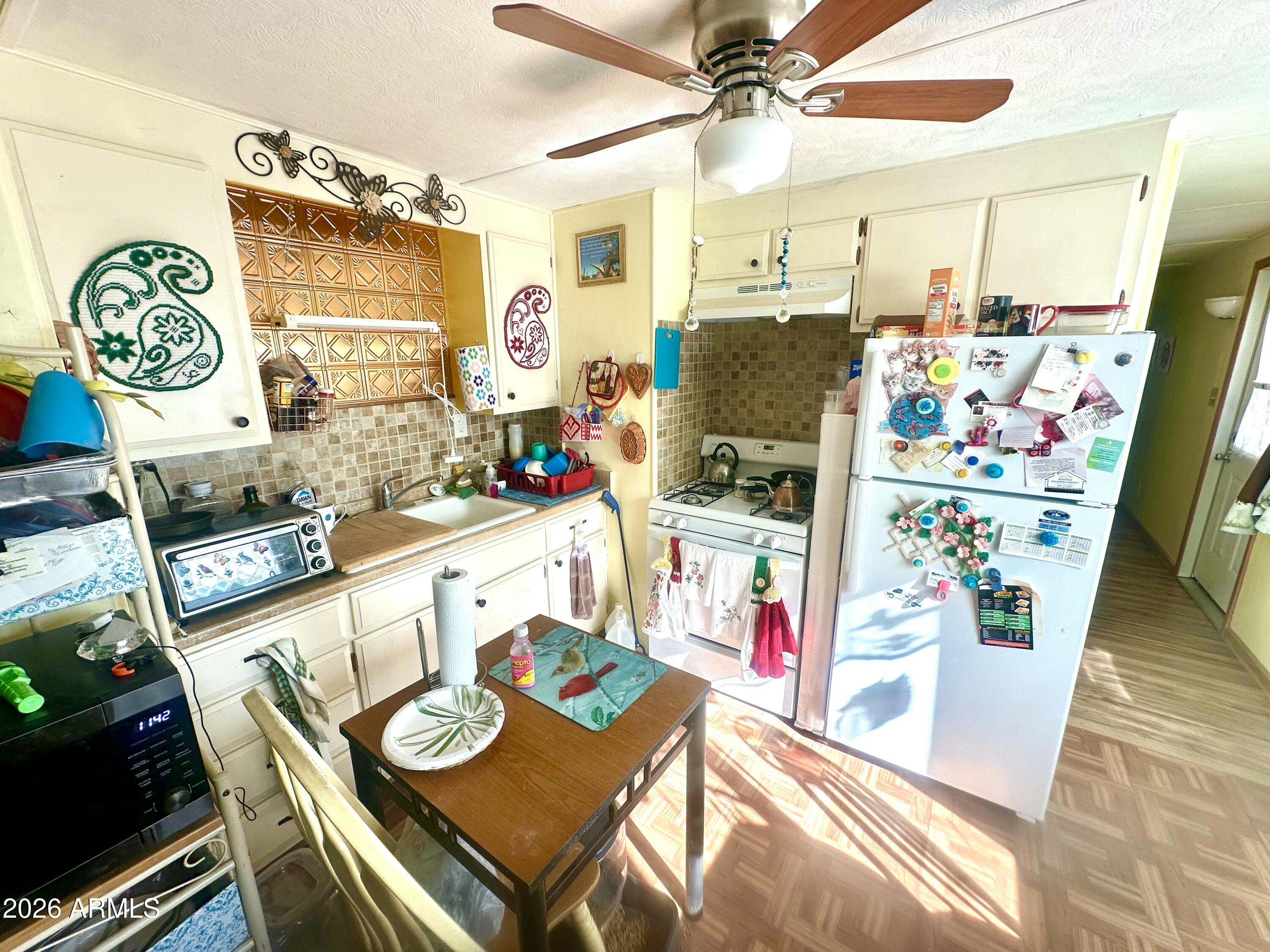 17412 East Trails End Road Mayer, AZ 86333 - Photo 10 of 28 a very nice looking dining room with a table and chairs