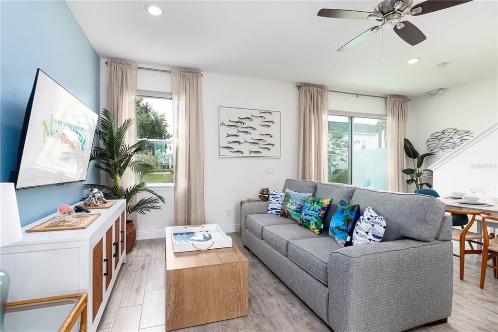 2960 On The Rocks Point Kissimmee, FL 34747 - Photo 5 of 17 a living room with furniture and a flat screen tv