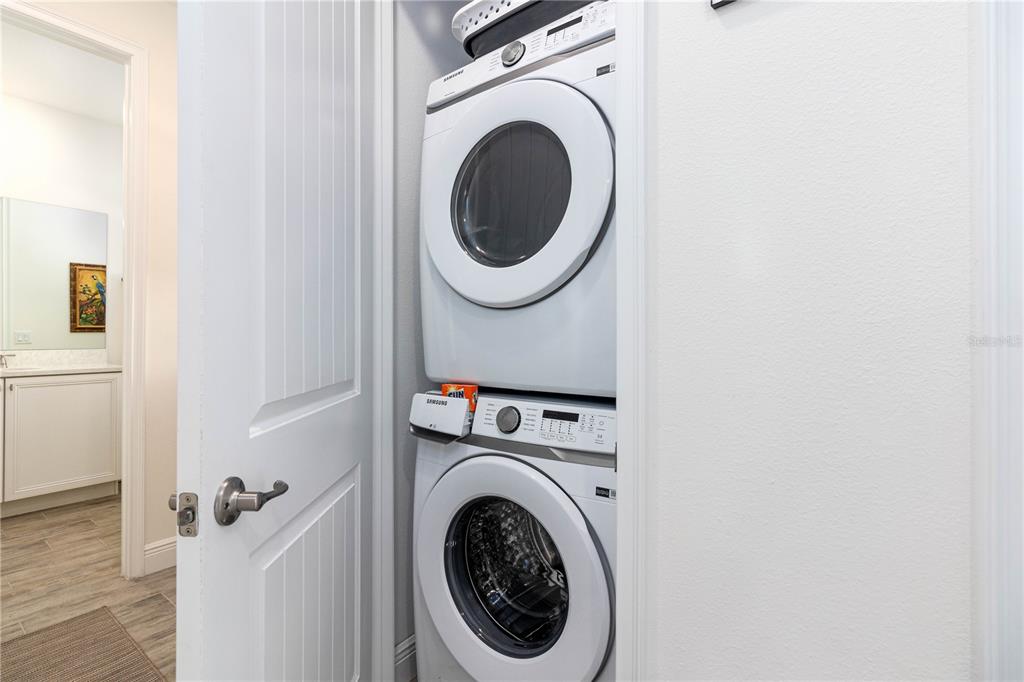 2960 On The Rocks Point Kissimmee, FL 34747 - Photo 10 of 17 a utility room with dryer and washer