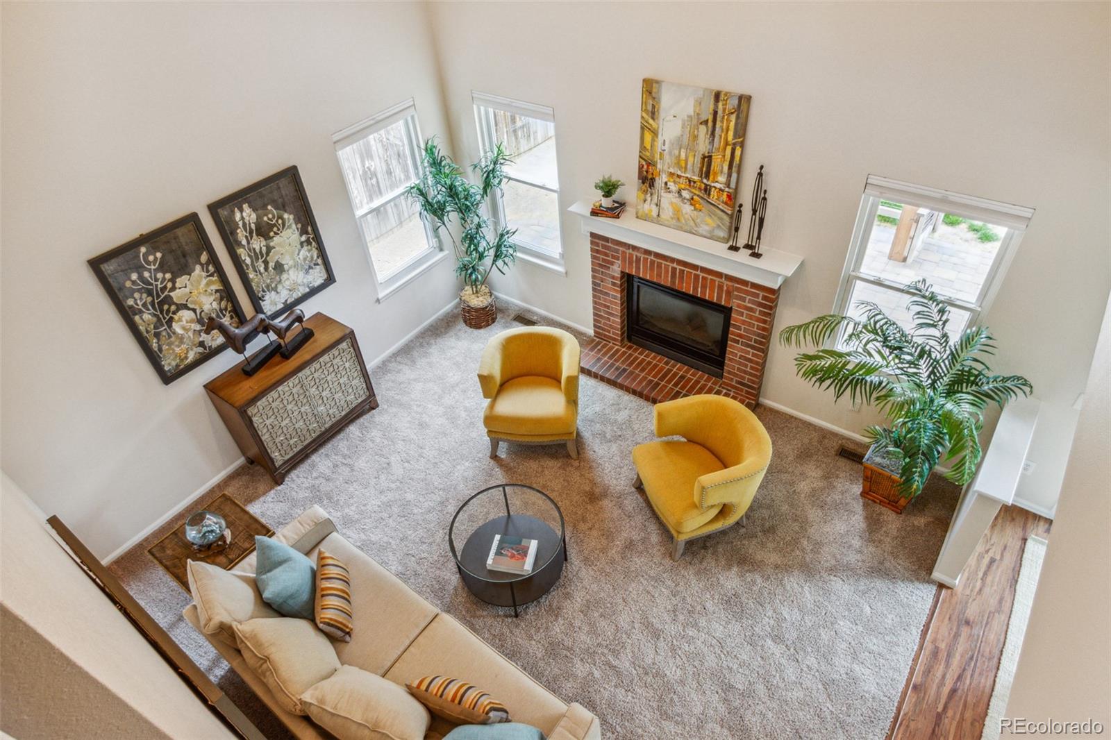 2975 East 133rd Circle Thornton, CO 80241 - Photo 16 of 29 a view of living room with furniture and a potted plant