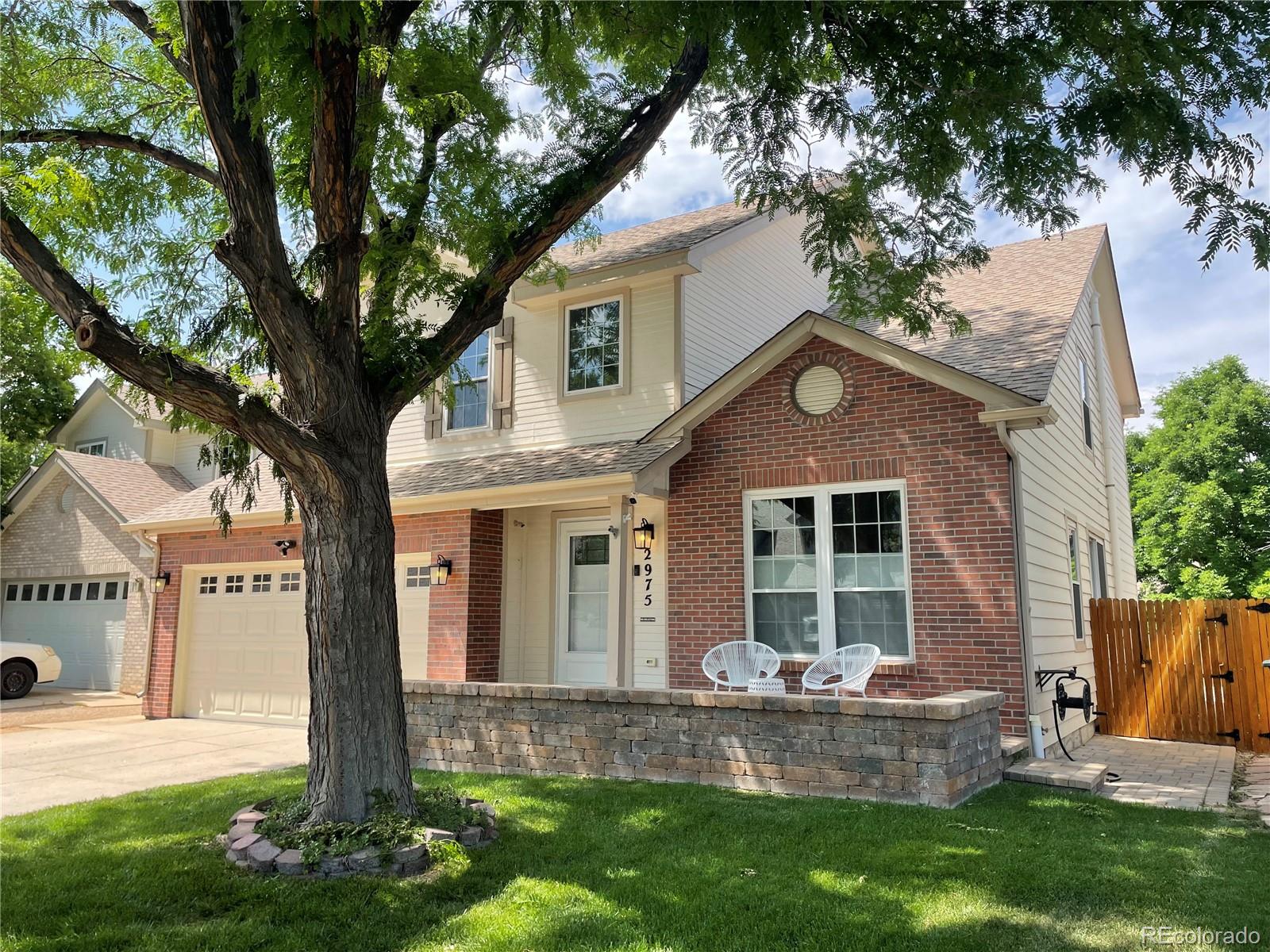 2975 East 133rd Circle Thornton, CO 80241 - Photo 2 of 29 a front view of house with yard and green space