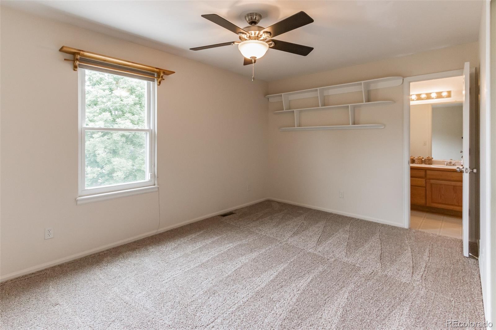 2975 East 133rd Circle Thornton, CO 80241 - Photo 24 of 29 a view of an empty room with a window