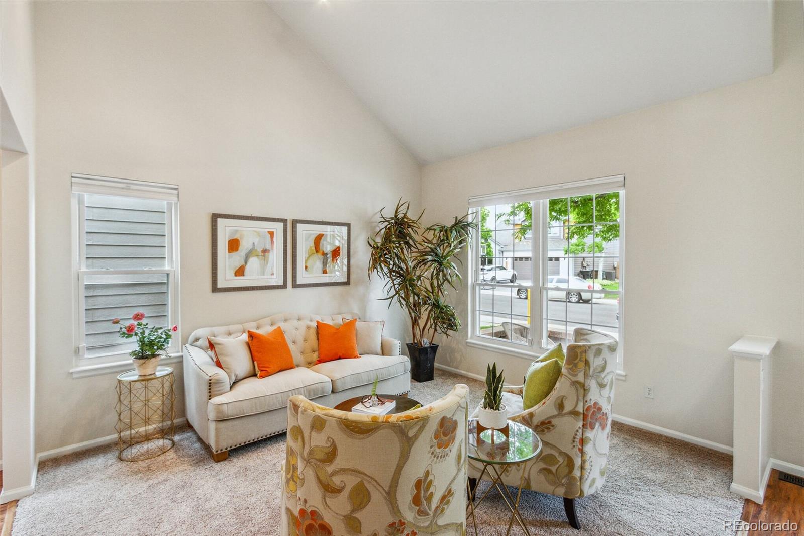 2975 East 133rd Circle Thornton, CO 80241 - Photo 3 of 29 a living room with furniture and a large window