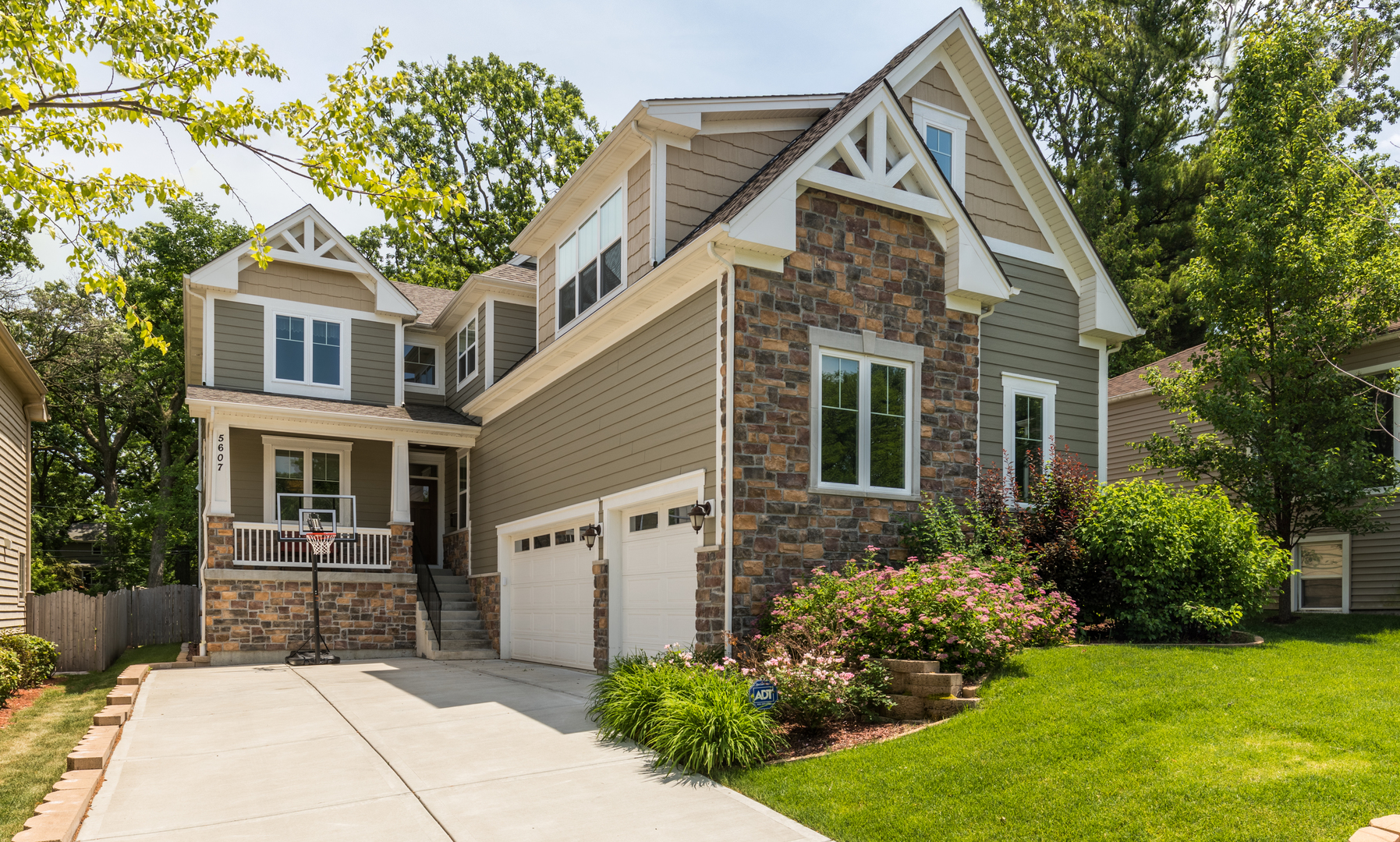 5607 Hillcrest Road Downers Grove, IL 60516 - Photo 1 of 1 a front view of a house with garden