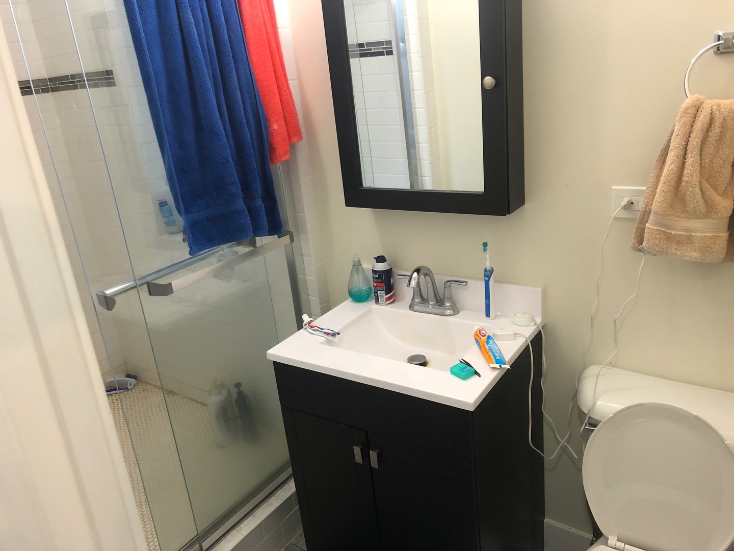 839 West Cornelia Avenue, Unit 3N Chicago, IL 60657 - Photo 7 of 7 a bathroom with a sink toilet and mirror