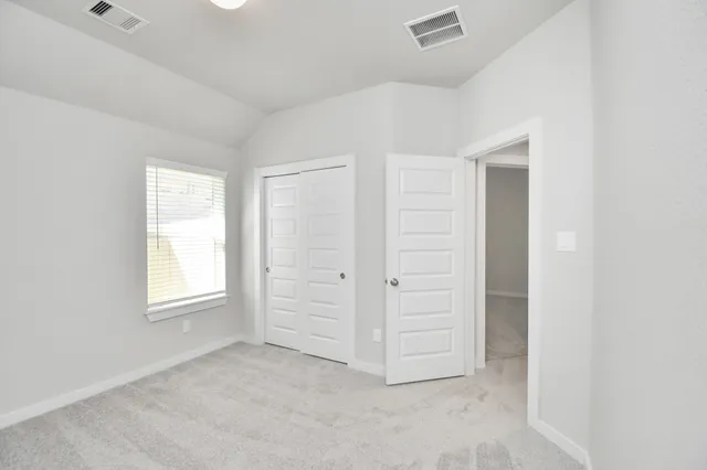 a front view of a house with yard