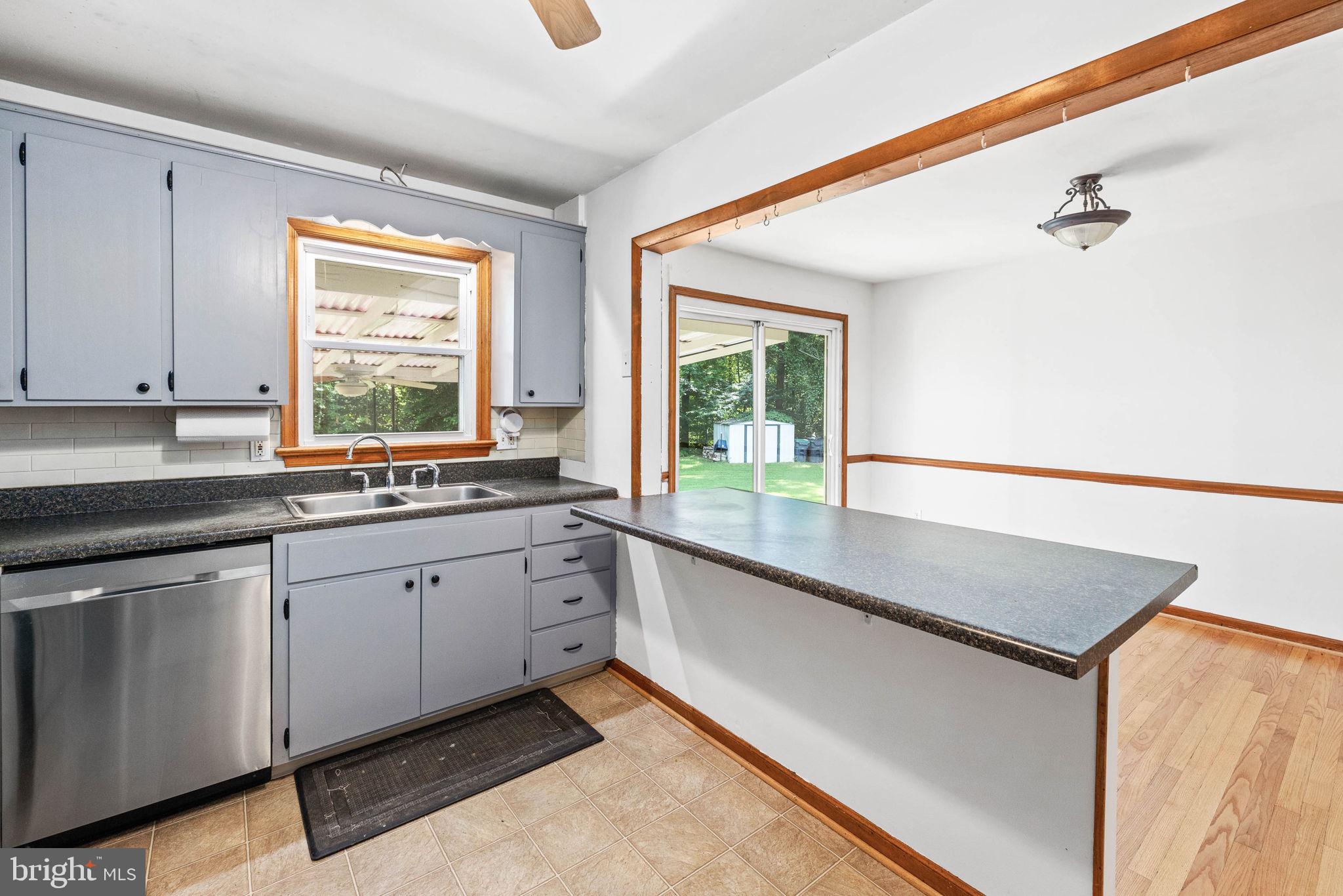 25 Sandy Ridge Court Fredericksburg, VA 22405 - Photo 22 of 36 Kitchen open to dining area and back slider door.