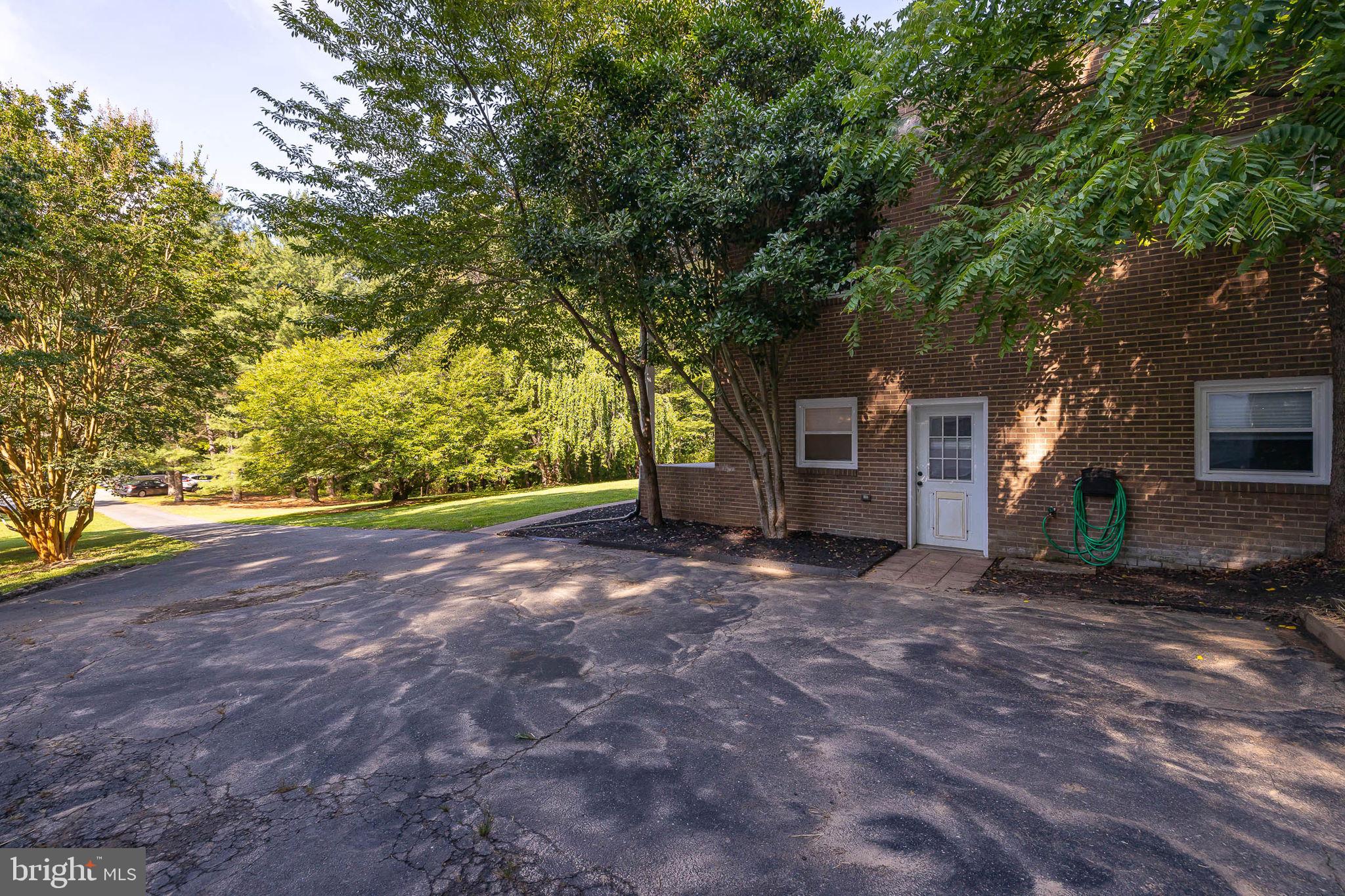 25 Sandy Ridge Court Fredericksburg, VA 22405 - Photo 4 of 36 Huge driveway & view of exterior basement entrance