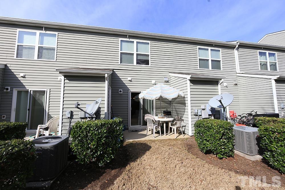 2927 Berkeley Springs Place Raleigh, NC 27616 - Photo 13 of 14 a view of a house with patio