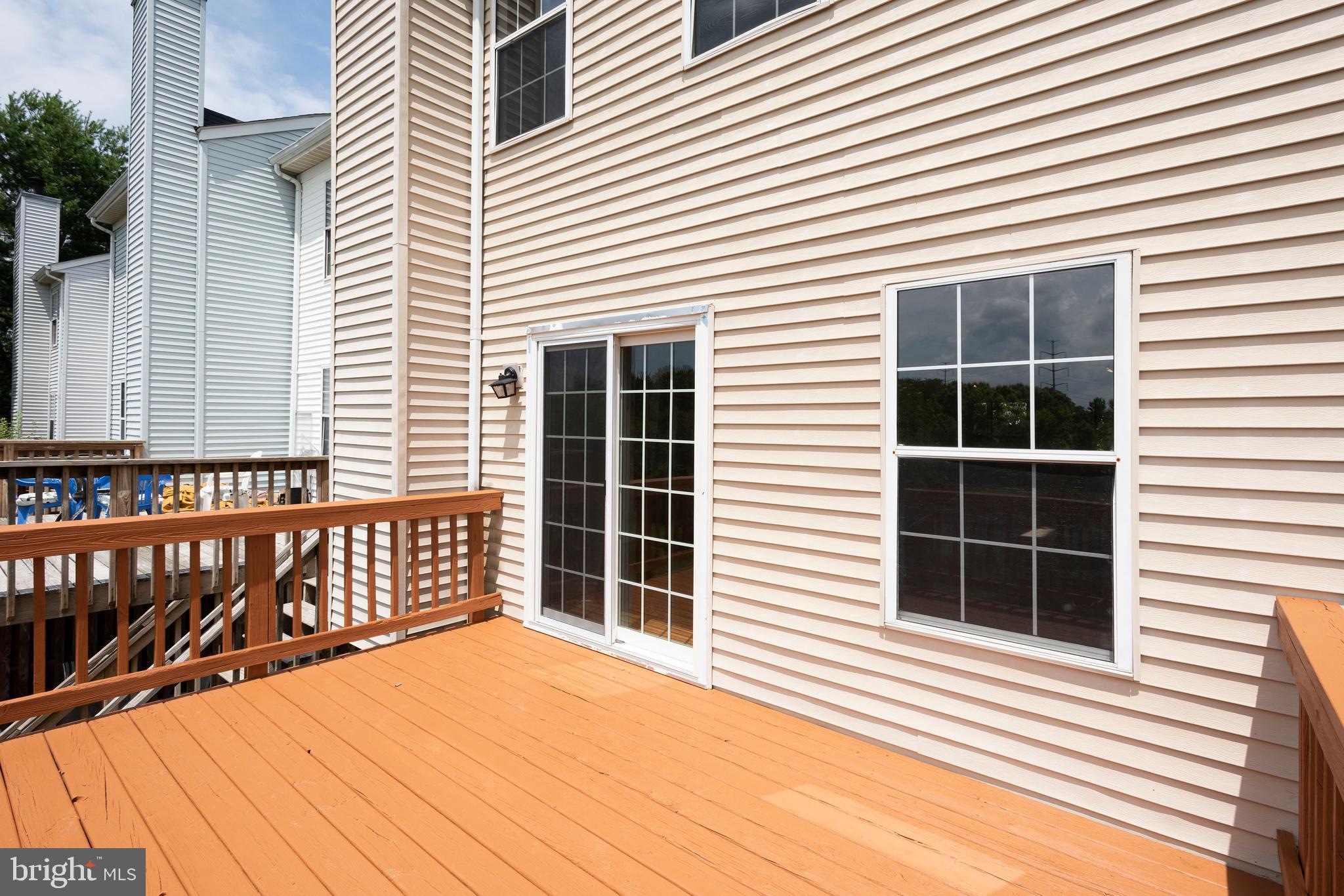 5505 Oberlin Place Frederick, MD 21703 - Photo 38 of 39 Deck going to main level of house