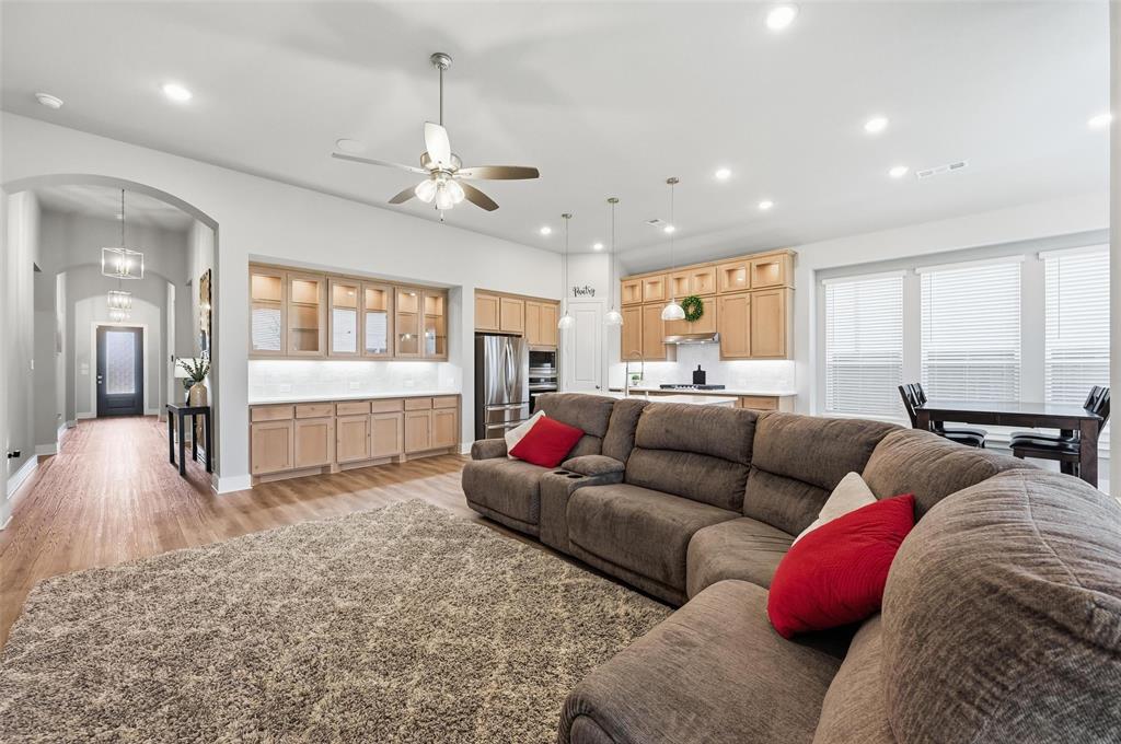 1205 Roundwash Way Midlothian, TX 76065 - Photo 5 of 38 a living room with furniture and a large window