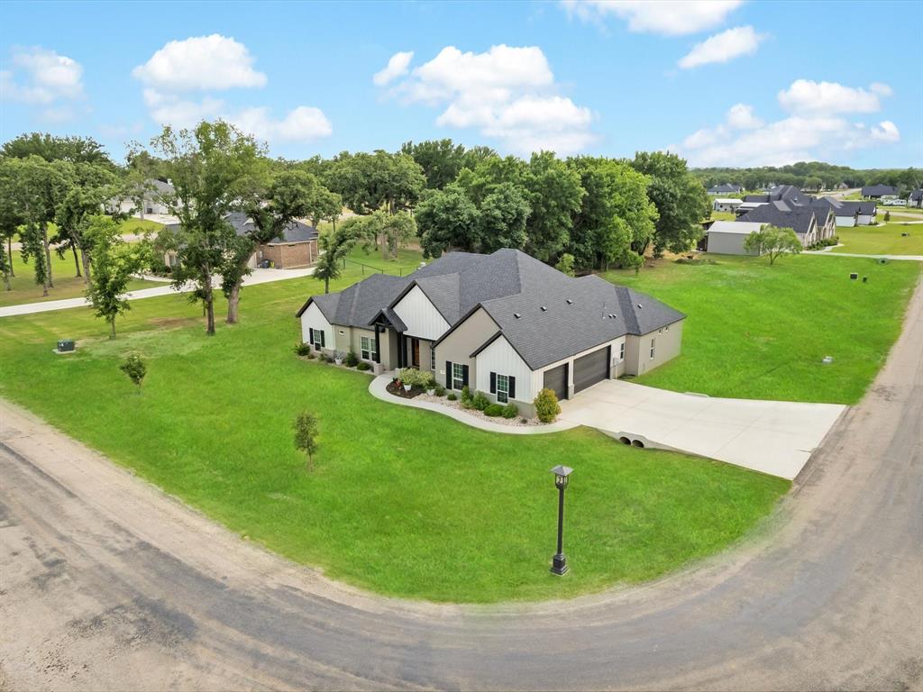 650 Winkler Way Springtown, TX 76082 - Photo 27 of 30 an aerial view of a house with pool