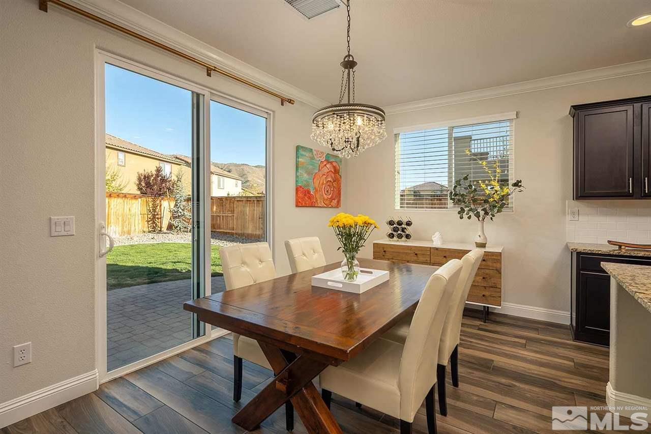 2820 Show Jumper Lane Reno, NV 89521 - Photo 17 of 40 a view of a dining room with furniture window and wooden floor