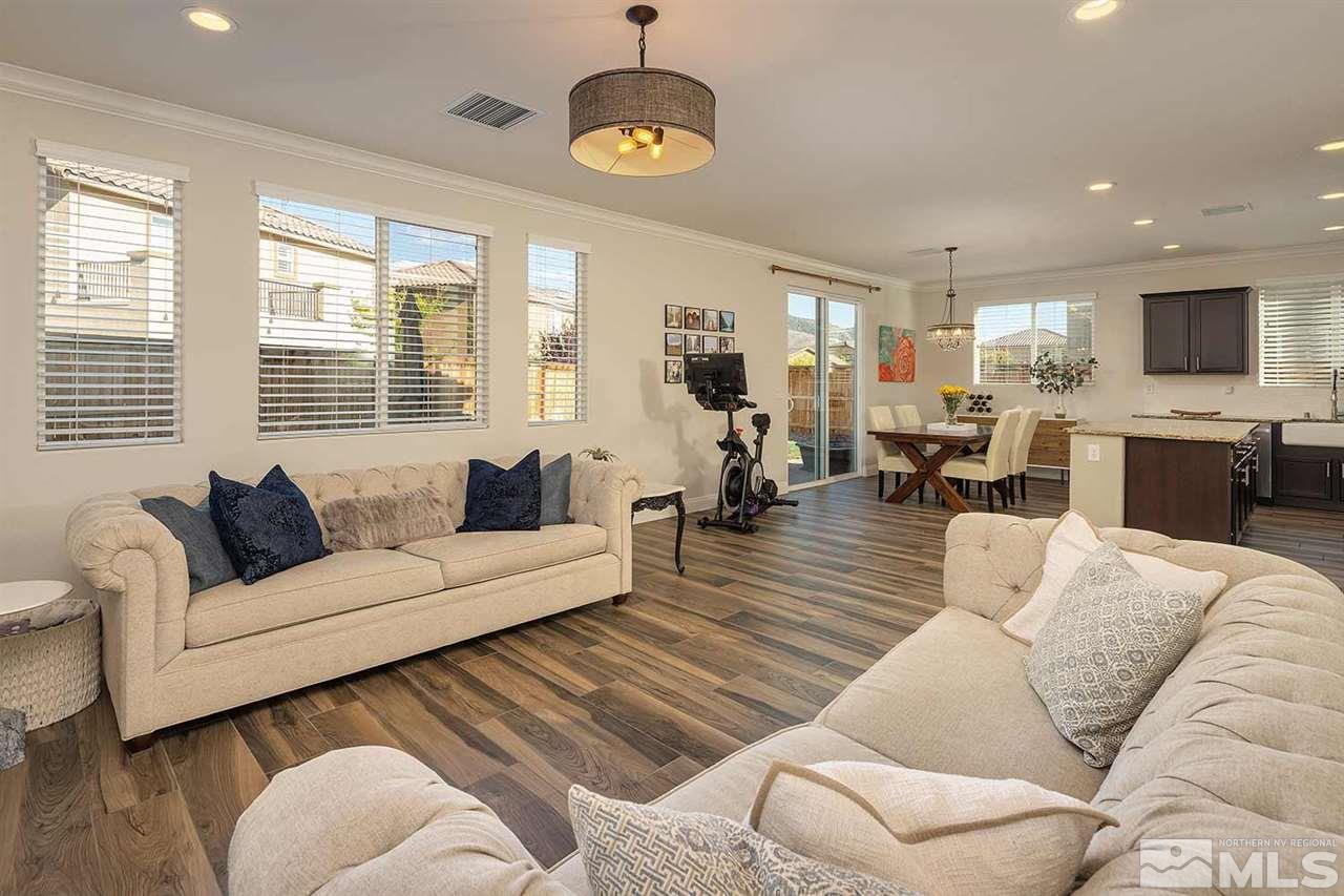 2820 Show Jumper Lane Reno, NV 89521 - Photo 19 of 40 a living room with furniture kitchen view and a large window