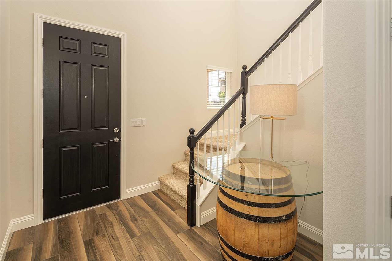 2820 Show Jumper Lane Reno, NV 89521 - Photo 22 of 40 a view of entryway with wooden floor and staircase
