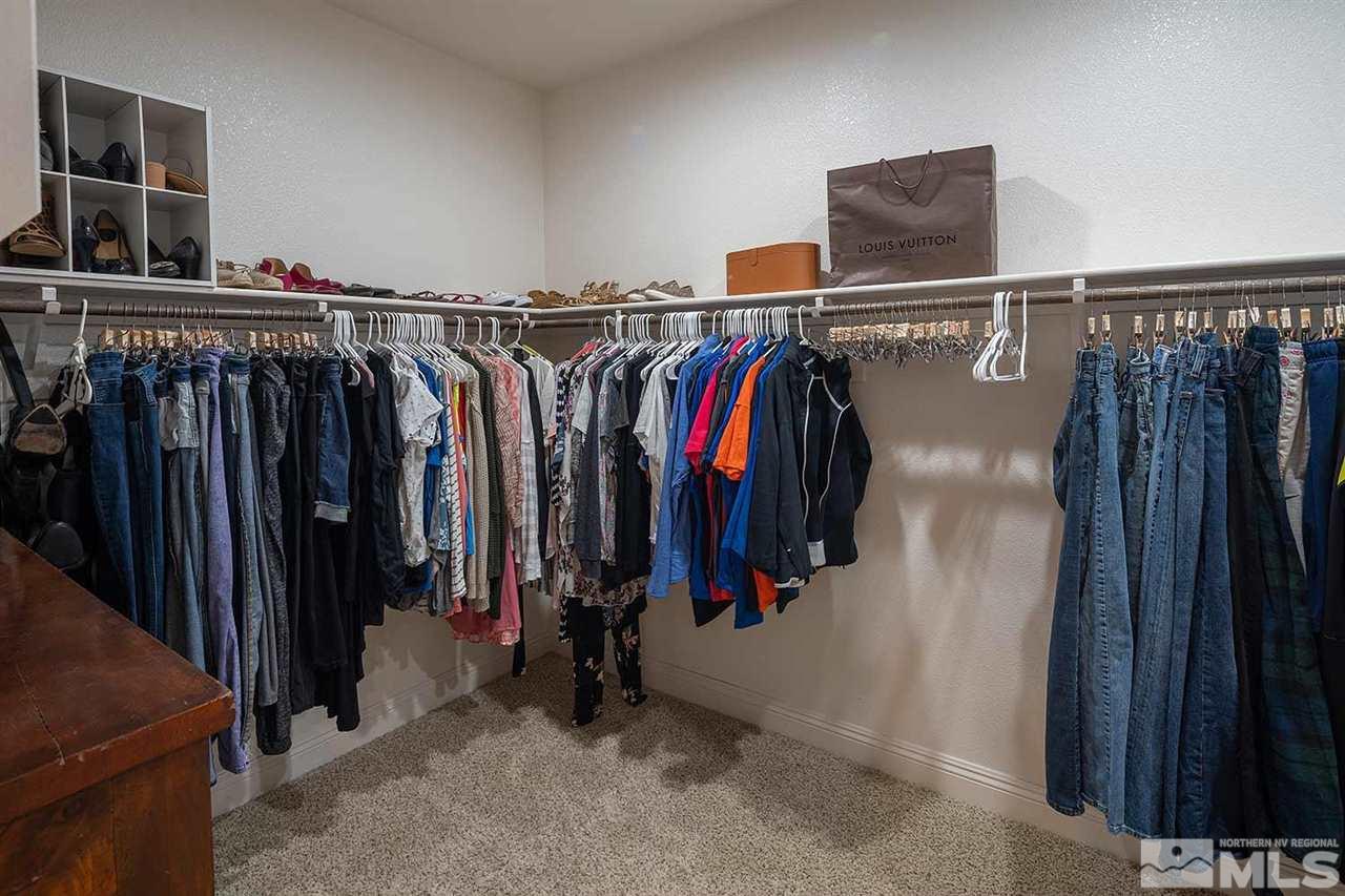 2820 Show Jumper Lane Reno, NV 89521 - Photo 24 of 40 a view of walk in closet with clothes