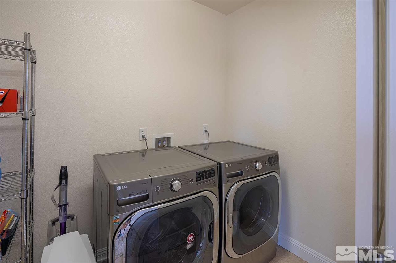 2820 Show Jumper Lane Reno, NV 89521 - Photo 27 of 40 a utility room with dryer and washer