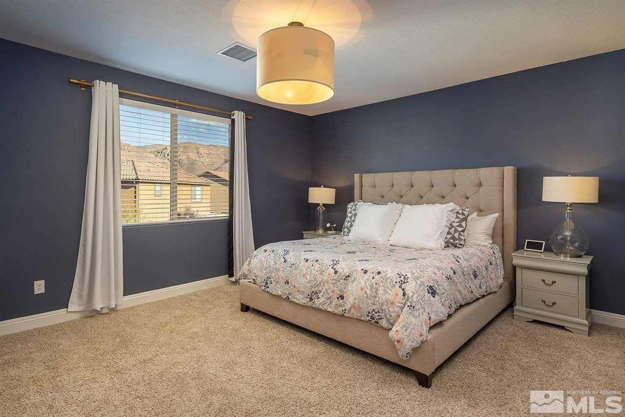 2820 Show Jumper Lane Reno, NV 89521 - Photo 5 of 40 a bedroom with a bed and a window