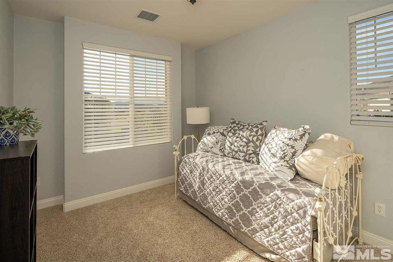 2820 Show Jumper Lane Reno, NV 89521 - Photo 9 of 40 a bedroom with a bed and a window