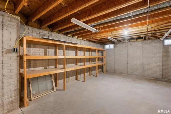 a view of a garage with wooden walls