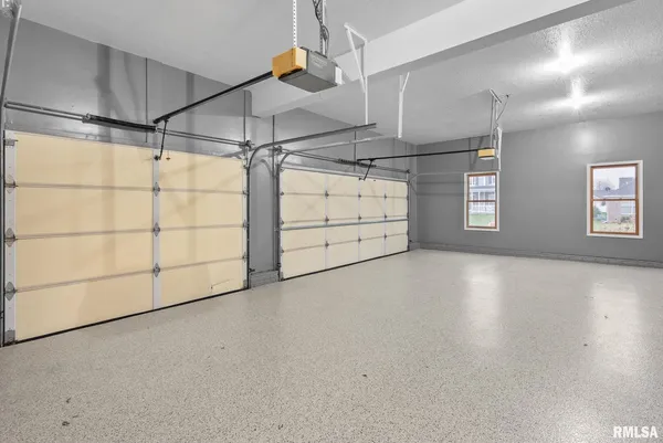 a very nice looking room with a ceiling fan