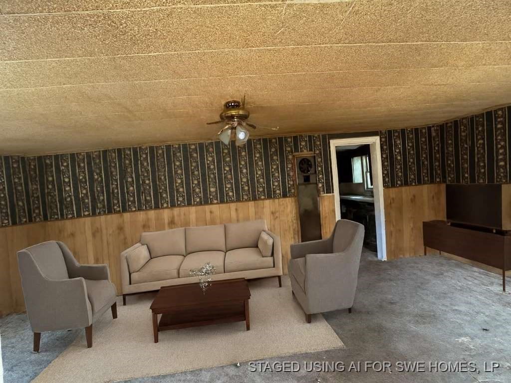 103 East 19th Street Hooks, TX 75561 - Photo 4 of 9 a living room with furniture and a rug