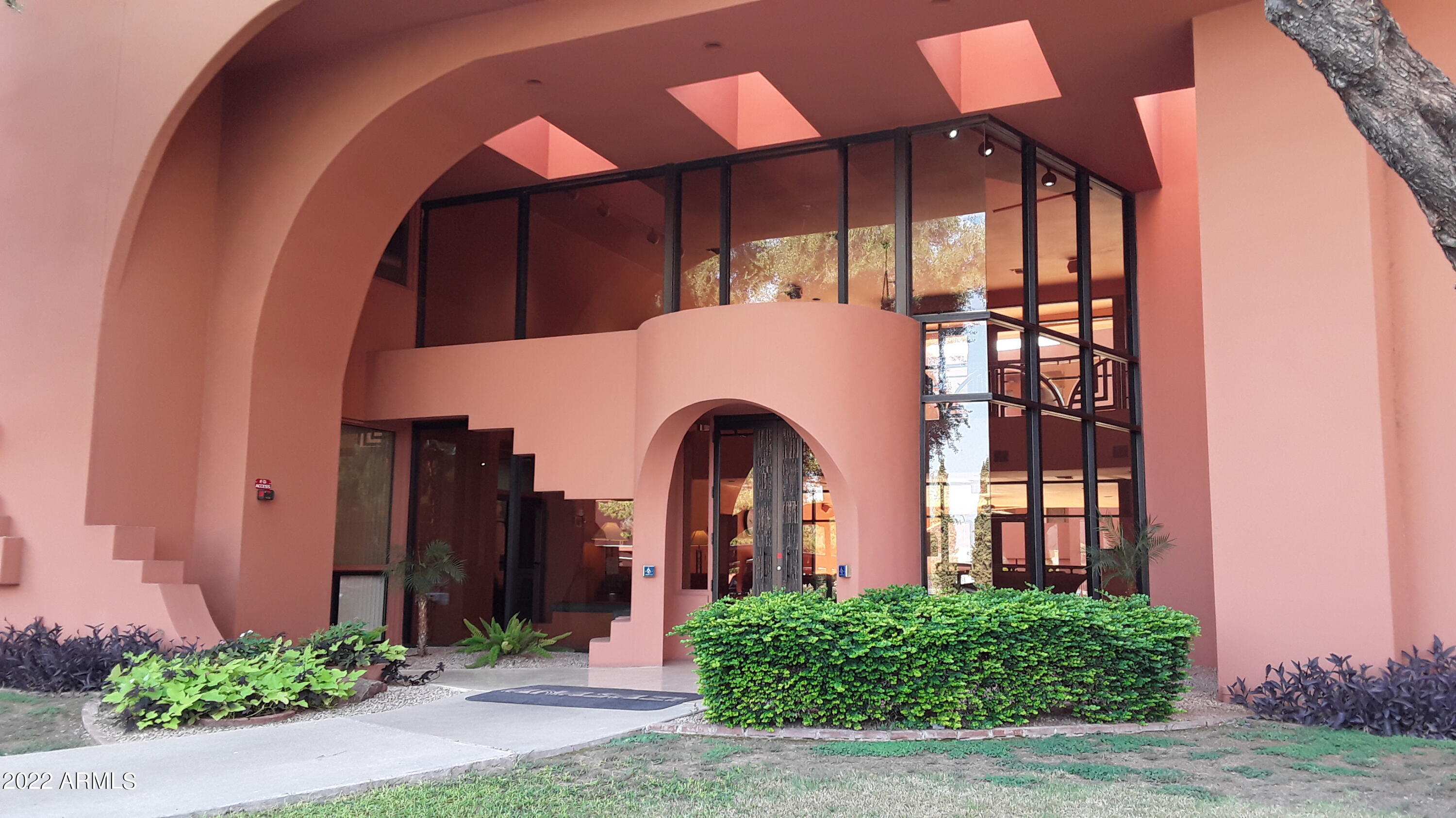 12212 North Paradise Village Parkway West, Unit 412C Phoenix, AZ 85032 - Photo 17 of 19 Anasazi clubhouse entrance