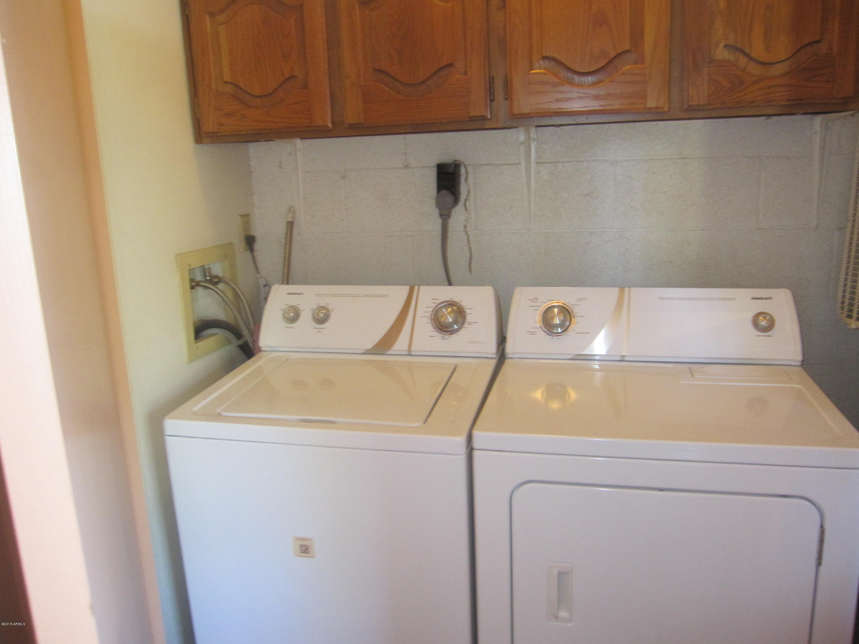 12212 North Paradise Village Parkway West, Unit 412C Phoenix, AZ 85032 - Photo 19 of 19 Laundry