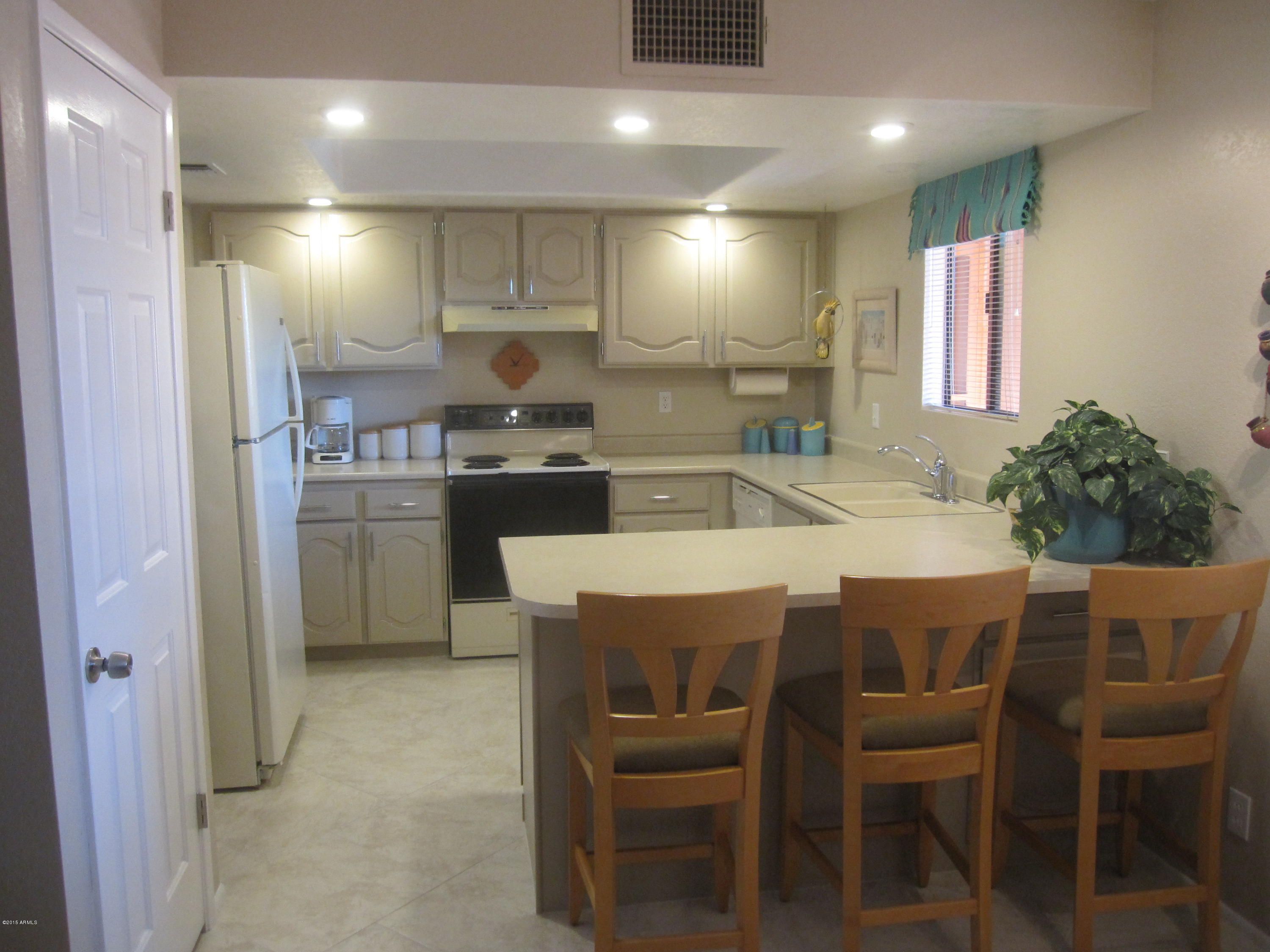12212 North Paradise Village Parkway West, Unit 412C Phoenix, AZ 85032 - Photo 7 of 19 Kitchen