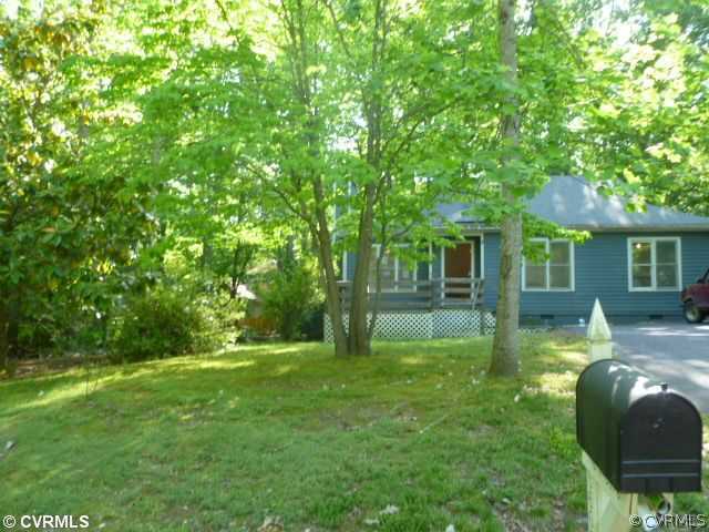 5606 Woods Walk Road Midlothian, VA 23112 - Photo 1 of 6 a view of a house with backyard