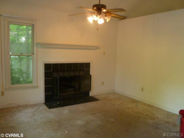 5606 Woods Walk Road Midlothian, VA 23112 - Photo 3 of 6 a view of empty room with fireplace