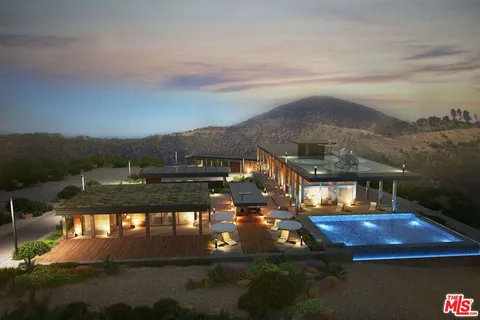 a view of a city with large trees