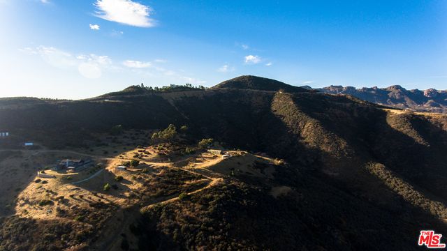 a view of ocean and sunset