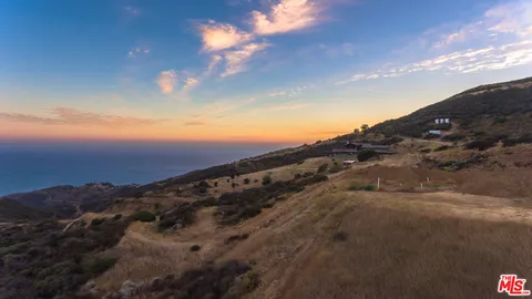 a view of a city with sunset view