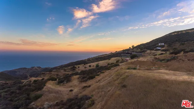 a view of a city with sunset view