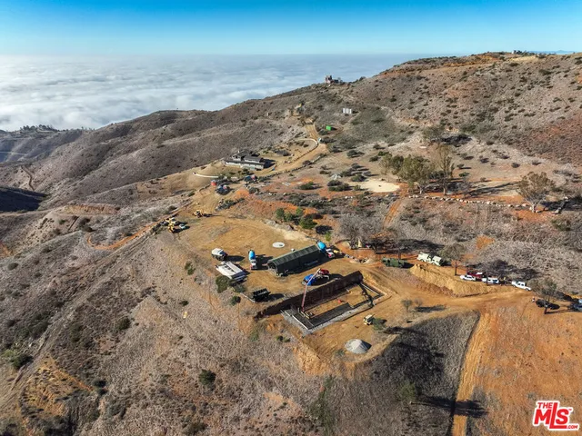 an aerial view of beach and ocean