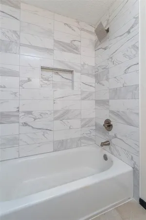 a bathroom with a bathtub