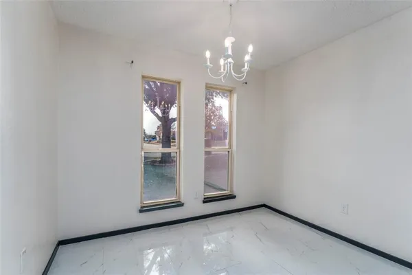 a view of a chandelier in a room