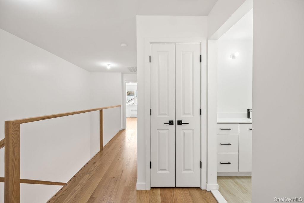 62 Blauvelt Road, Unit 202 Monsey, NY 10952 - Photo 19 of 34 a view of a hallway with wooden floor