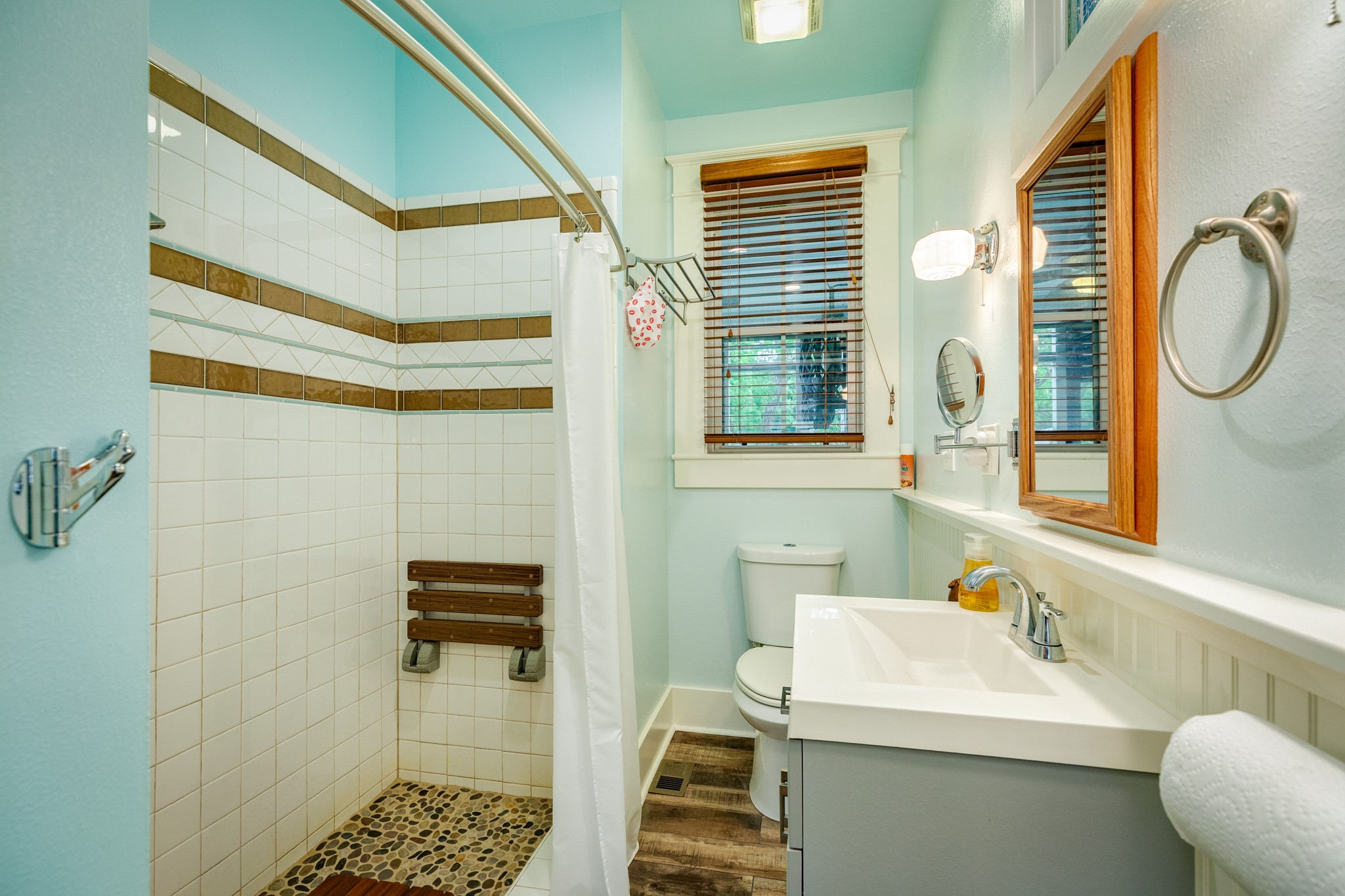 3727 Avenue R Galveston, TX 77550 - Photo 20 of 48 Unit 1, second bathroom features a spacious walk in shower. Easily accessible to the outdoor patio as well.
