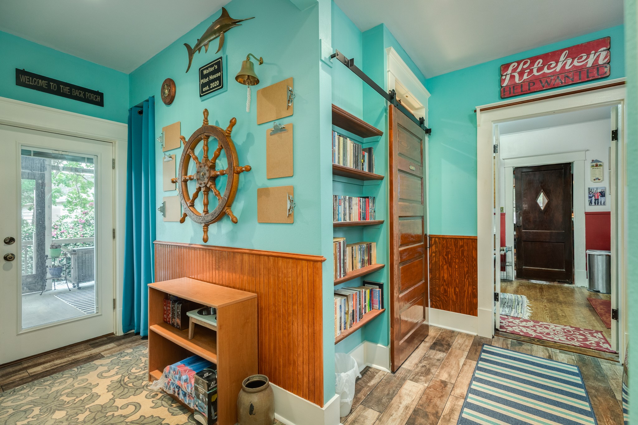 3727 Avenue R Galveston, TX 77550 - Photo 21 of 48 Unit 1 view of hallway facing the laundry and kitchen to the right and the door to the outdoor patio to the left.