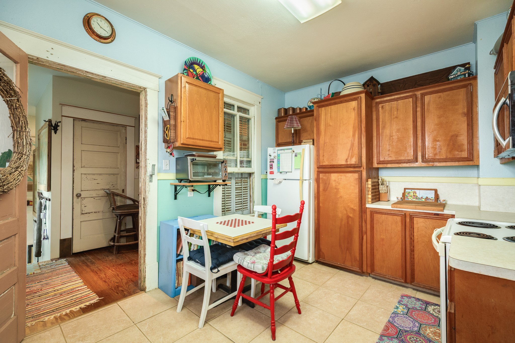 3727 Avenue R Galveston, TX 77550 - Photo 31 of 48 Unit 2 kitchen with in kitchen dining facing the rear hallway.