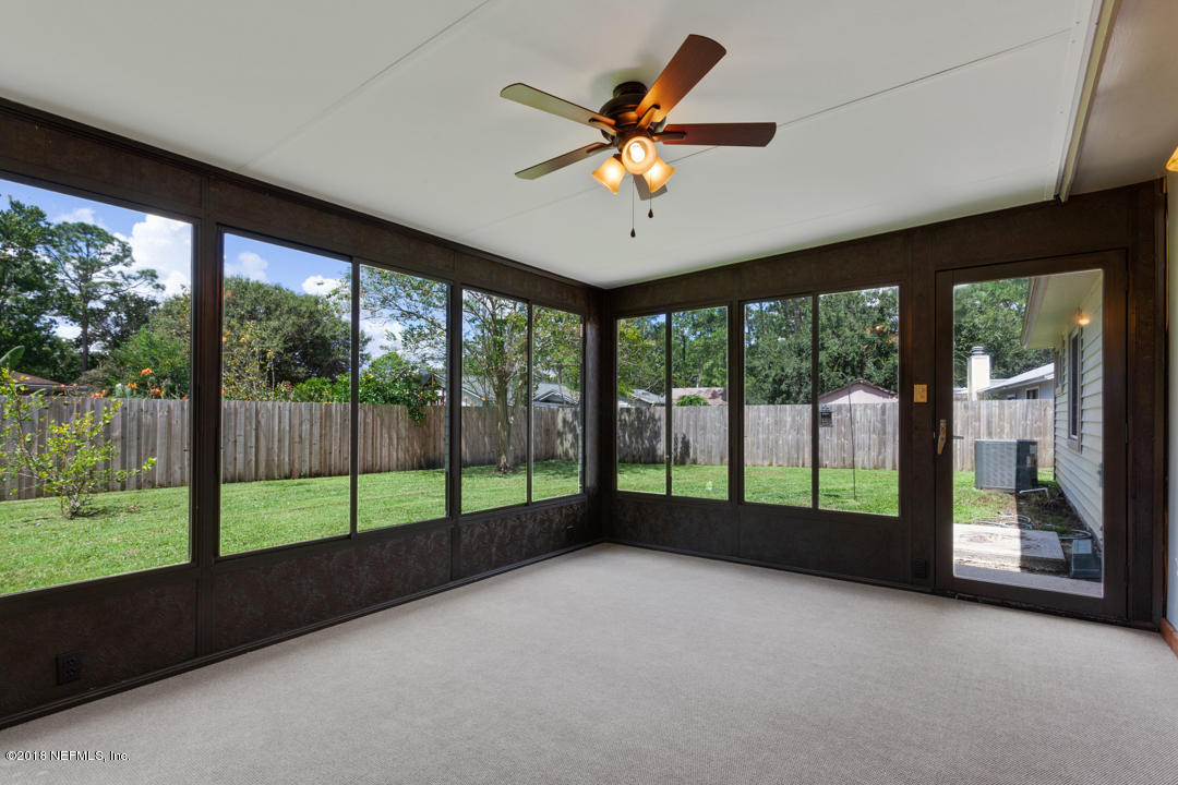 10836 Reading Road Jacksonville, FL 32257 - Photo 24 of 32 a view of room with window and a ceiling fan