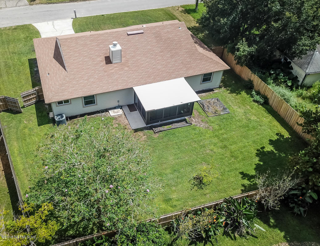 10836 Reading Road Jacksonville, FL 32257 - Photo 25 of 32 an aerial view of a house with a yard and trees