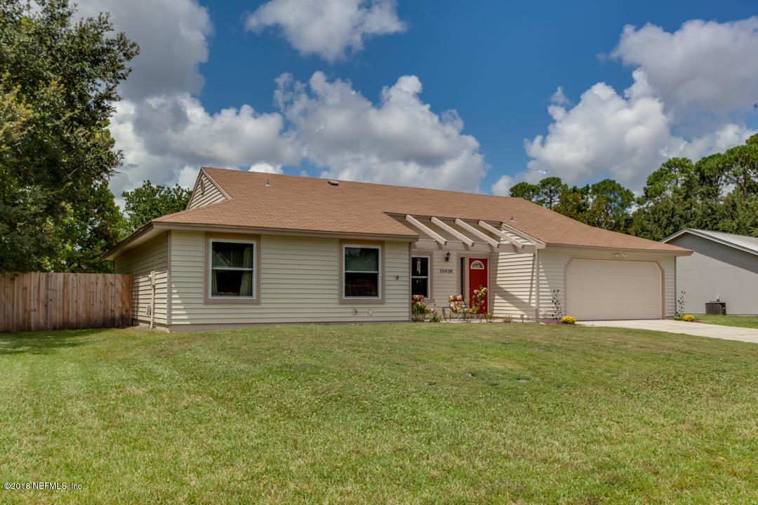 10836 Reading Road Jacksonville, FL 32257 - Photo 31 of 32 a view of a house with a yard