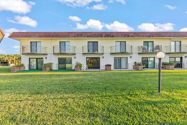 a bathroom with a double vanity sink and mirror