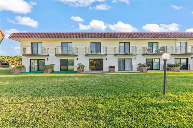 a bathroom with a double vanity sink and mirror