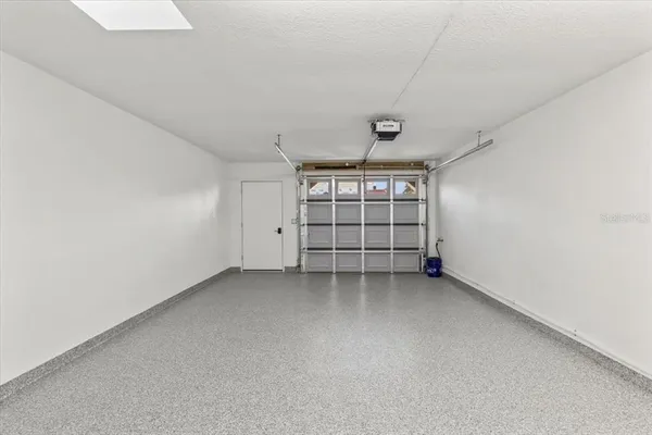 an aerial view of a house with a ocean view