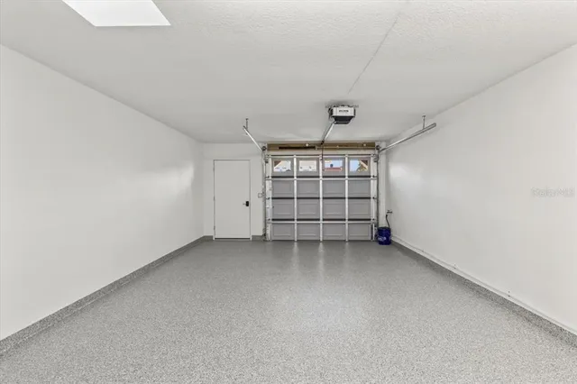 an aerial view of a house with a ocean view