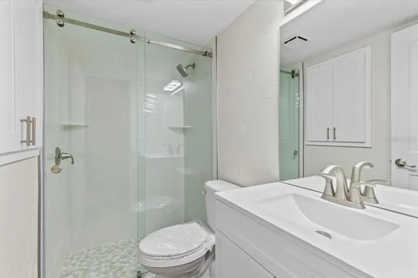 a view of entryway with wooden floor and stairs